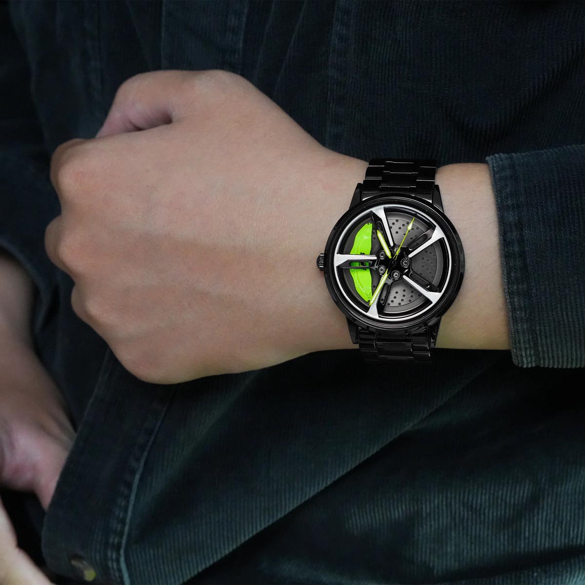 Model Wearing HMNWatch - Premium Men's Racing Watch with Spinning Wheel Design | Stylish and Durable Timepiece Inspired by Automotive Aesthetics | High-Quality Craftsmanship for Car Enthusiasts